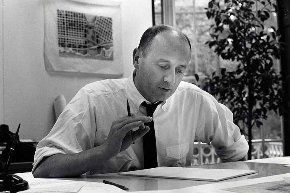 Kevin Roche at desk